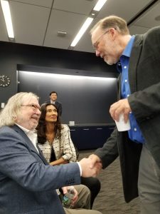 James Allison shaking hands with Fred Ramsdell of Parker Institute after winning the Nobel Prize